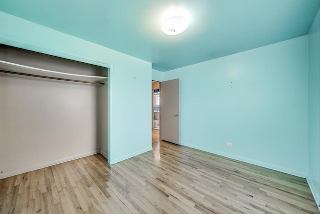 6105 W 83rd St, Burbank, IL 60459 - unfurnished bedroom with wood finished floors and a closet