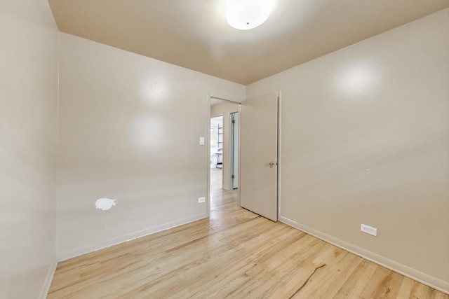 6105 W 83rd St, Burbank, IL 60459 - unfurnished room with light wood finished floors and baseboards