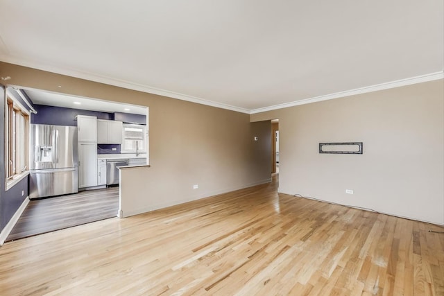 6105 W 83rd St, Burbank, IL 60459 - unfurnished living room featuring light wood finished floors and crown molding