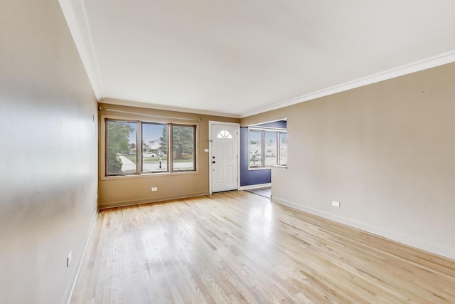 6105 W 83rd St, Burbank, IL 60459 - spare room featuring ornamental molding and light wood finished floors