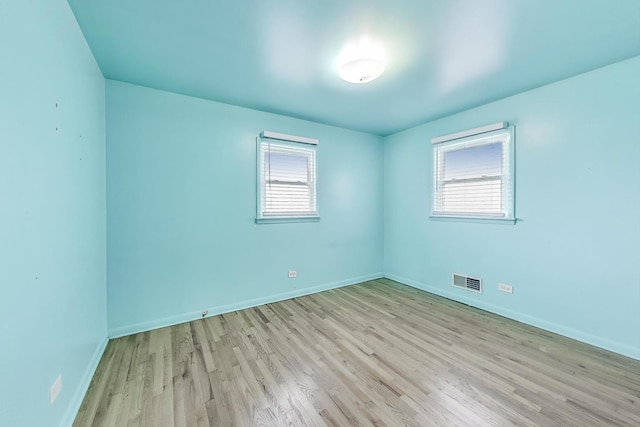 6105 W 83rd St, Burbank, IL 60459 - spare room with wood finished floors and baseboards