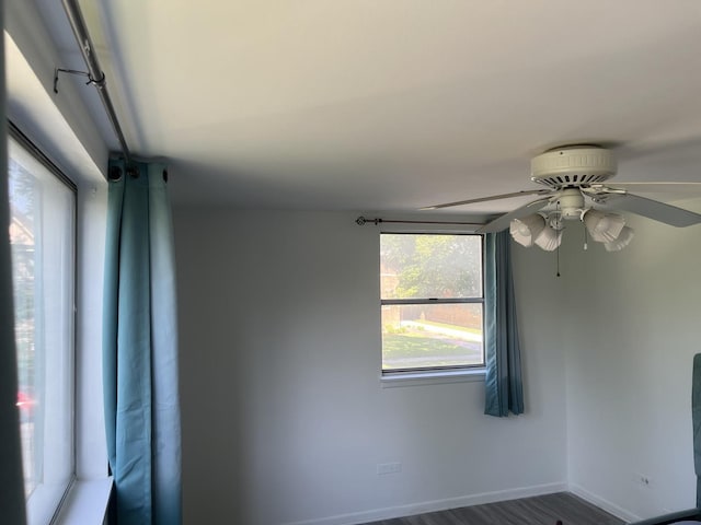 415 Wesley Ave Unit 21, Oak Park, IL 60302 - spare room featuring a ceiling fan and baseboards