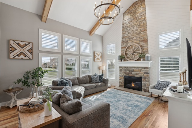 39W869 Kellar Sq, Geneva, IL 60134 - living area featuring high vaulted ceiling, wood finished floors, a chandelier, a fireplace, and beamed ceiling