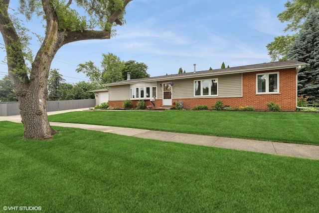 609 N Eastman Dr, Mount Prospect, IL 60056 - single story home featuring brick siding, concrete driveway, and an attached garage