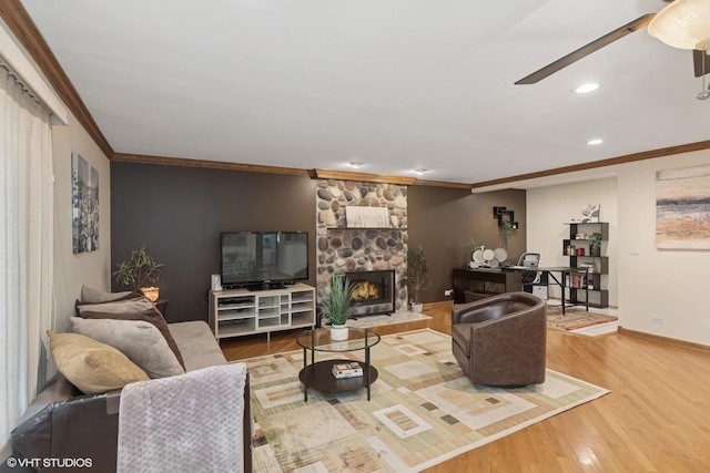 609 N Eastman Dr, Mount Prospect, IL 60056 - living area featuring ornamental molding, wood finished floors, a fireplace, recessed lighting, and ceiling fan