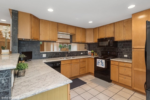 609 N Eastman Dr, Mount Prospect, IL 60056 - kitchen featuring black appliances, light tile patterned floors, tasteful backsplash, recessed lighting, and light stone countertops