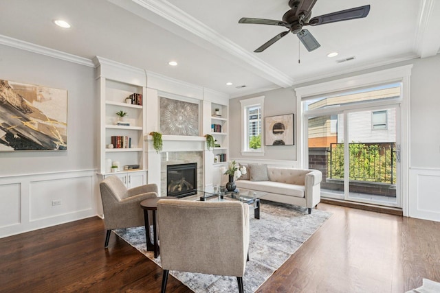 450 N Sangamon St Unit 4, Chicago, IL 60642 - living room featuring ornamental molding, dark wood-style flooring, a glass covered fireplace, a decorative wall, and a ceiling fan