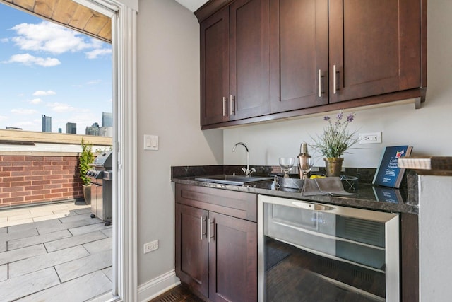 450 N Sangamon St Unit 4, Chicago, IL 60642 - indoor wet bar featuring wine cooler, healthy amount of natural light, and wood finished floors