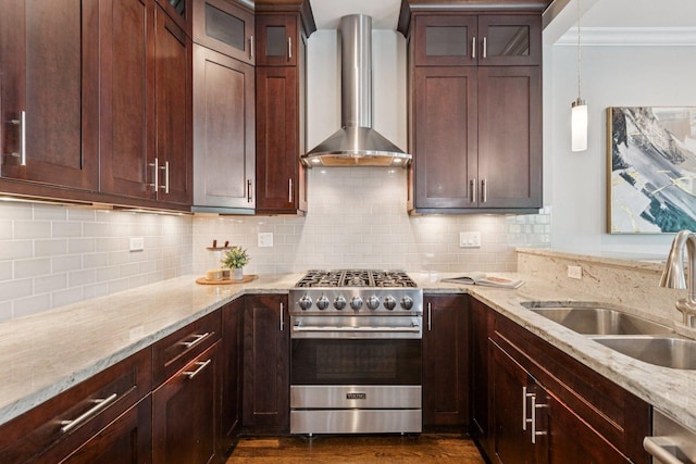 450 N Sangamon St Unit 4, Chicago, IL 60642 - kitchen featuring stainless steel appliances, wall chimney exhaust hood, crown molding, and light stone countertops