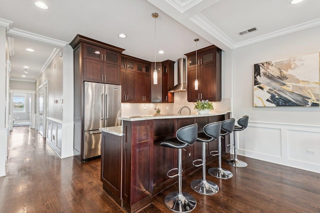 450 N Sangamon St Unit 4, Chicago, IL 60642 - kitchen with high quality fridge, wall chimney exhaust hood, a decorative wall, dark wood-style floors, and ornamental molding