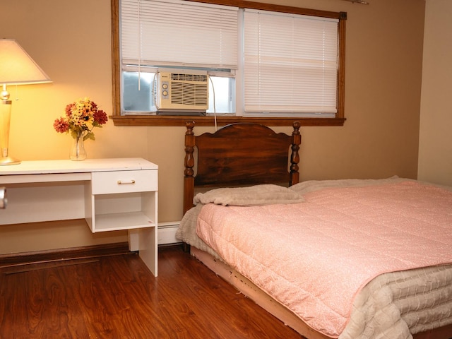 9275 W Noel Ave Unit 3C, Des Plaines, IL 60016 - bedroom featuring dark wood-style flooring, cooling unit, a desk, and a baseboard radiator