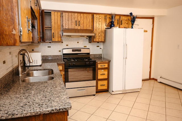 9275 W Noel Ave Unit 3C, Des Plaines, IL 60016 - kitchen featuring stainless steel gas range, exhaust hood, freestanding refrigerator, and decorative backsplash