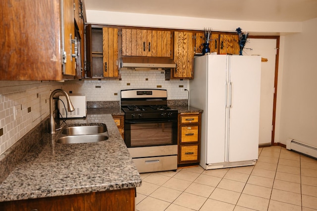 9275 W Noel Ave Unit 3C, Des Plaines, IL 60016 - kitchen with gas stove, freestanding refrigerator, under cabinet range hood, and backsplash