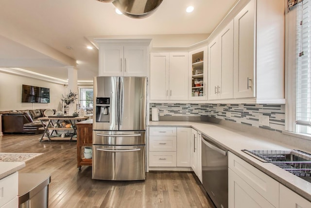 3239 Wesley Ave, Berwyn, IL 60402 - kitchen featuring appliances with stainless steel finishes, white cabinets, backsplash, and recessed lighting