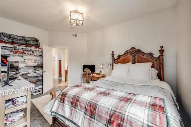 3239 Wesley Ave, Berwyn, IL 60402 - bedroom with light carpet and a chandelier