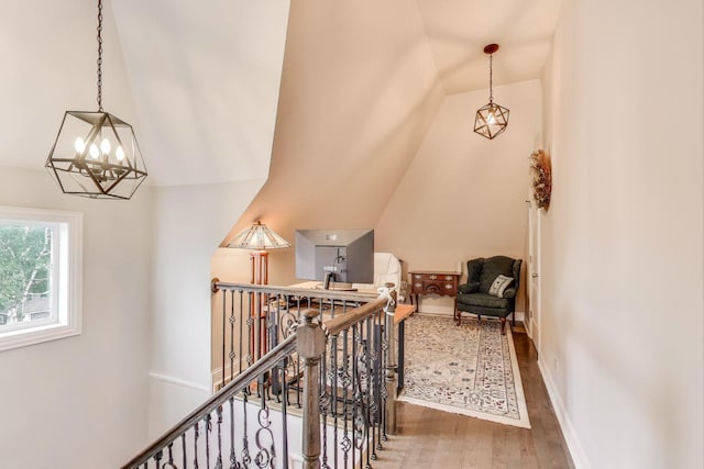 3239 Wesley Ave, Berwyn, IL 60402 - corridor with wood finished floors, an upstairs landing, a chandelier, and lofted ceiling