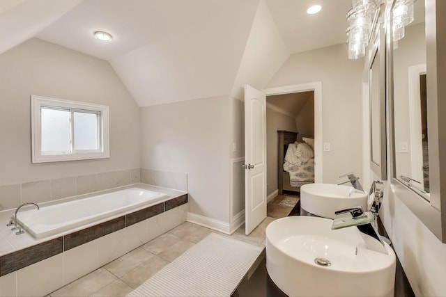 3239 Wesley Ave, Berwyn, IL 60402 - bathroom with a garden tub, lofted ceiling, and tile patterned floors