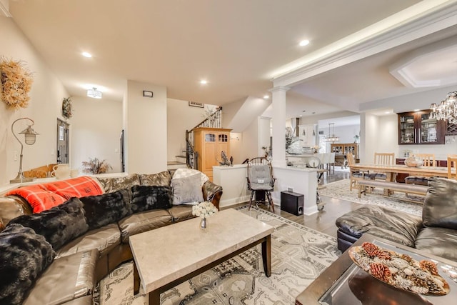 3239 Wesley Ave, Berwyn, IL 60402 - living room featuring ornate columns, recessed lighting, wood finished floors, and stairway