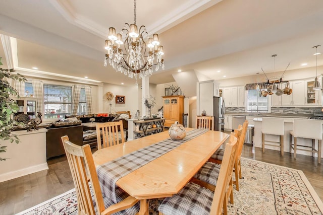 3239 Wesley Ave, Berwyn, IL 60402 - dining room with healthy amount of natural light, wood finished floors, a chandelier, and recessed lighting