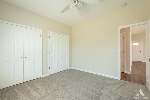 965 W Bergera Rd, Braidwood, IL 60408 - unfurnished bedroom with two closets, carpet flooring, and ceiling fan