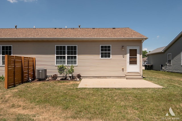 965 W Bergera Rd, Braidwood, IL 60408 - rear view of house featuring a patio, a lawn, entry steps, and a shingled roof