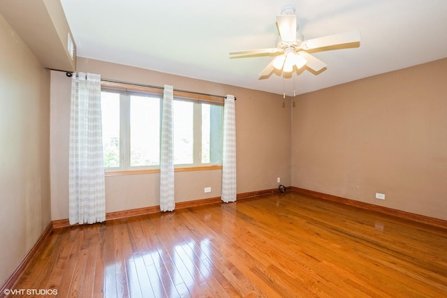 12720 Carriage Ln Unit H2, Crestwood, IL 60418 - unfurnished room with light wood finished floors and a ceiling fan