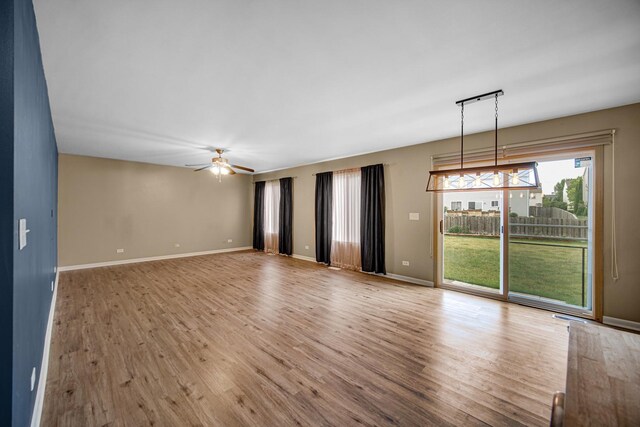 352 Westport Dr, Pingree Grove, IL 60140 - empty room featuring wood finished floors and a ceiling fan