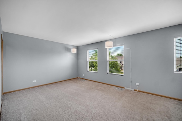 352 Westport Dr, Pingree Grove, IL 60140 - carpeted spare room featuring baseboards