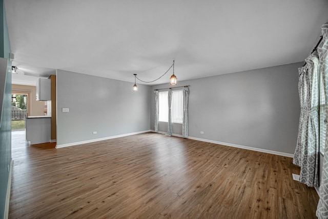 352 Westport Dr, Pingree Grove, IL 60140 - empty room with dark wood finished floors and baseboards