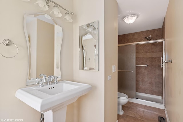 6162 Crossland Blvd, Gurnee, IL 60031 - bathroom with a shower stall and tile patterned flooring