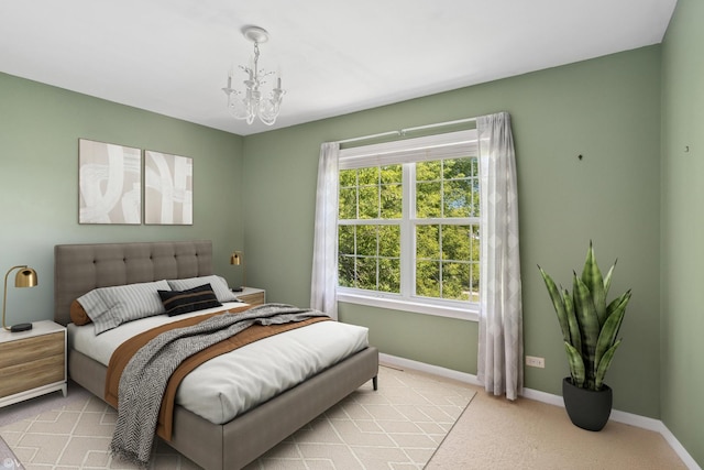 6162 Crossland Blvd, Gurnee, IL 60031 - bedroom with a chandelier and light carpet