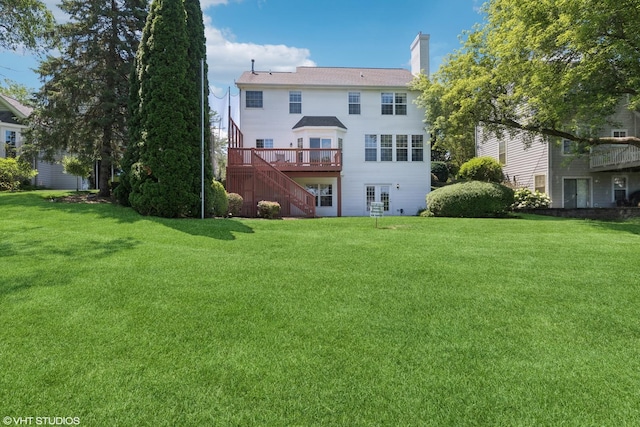 6162 Crossland Blvd, Gurnee, IL 60031 - back of property with stairs, a yard, a deck, and a chimney