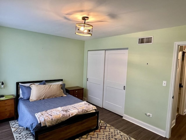 7727 Bristol Park Dr Unit 7727, Tinley Park, IL 60477 - bedroom with dark wood finished floors and a closet