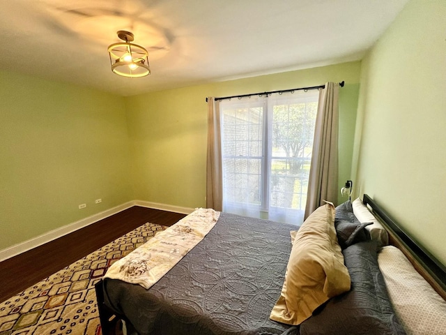 7727 Bristol Park Dr Unit 7727, Tinley Park, IL 60477 - bedroom with wood finished floors and baseboards