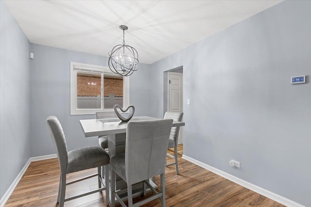 15117 Madison Ave, Dolton, IL 60419 - dining room with a chandelier and wood finished floors