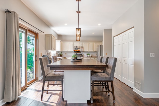 9890 Riverside Dr, Huntley, IL 60142 - dining space featuring dark wood finished floors and recessed lighting