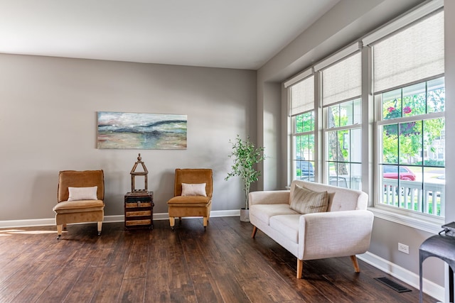 9890 Riverside Dr, Huntley, IL 60142 - living area featuring dark wood-style flooring and baseboards