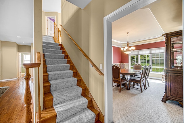 541 Clover Dr, Algonquin, IL 60102 - stairway featuring a chandelier, crown molding, recessed lighting, and wood finished floors