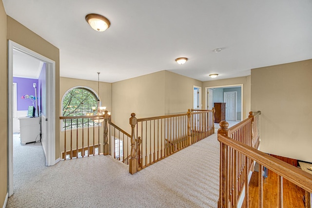 541 Clover Dr, Algonquin, IL 60102 - hall with an upstairs landing, carpet, and a chandelier