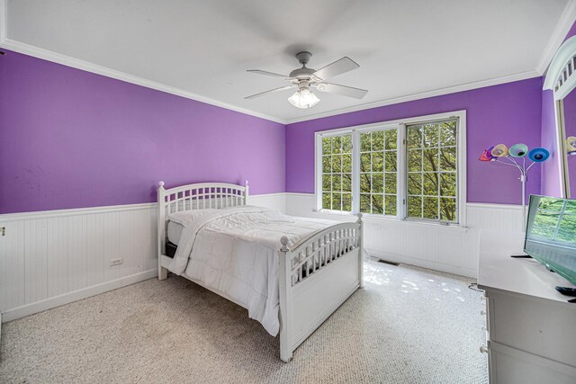 541 Clover Dr, Algonquin, IL 60102 - carpeted bedroom with wainscoting, crown molding, ceiling fan, and wooden walls