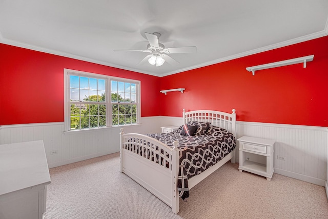 541 Clover Dr, Algonquin, IL 60102 - carpeted bedroom with a wainscoted wall, wood walls, ornamental molding, and ceiling fan