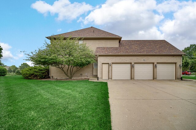 541 Clover Dr, Algonquin, IL 60102 - view of front of property with driveway, a garage, a front lawn, roof with shingles, and brick siding
