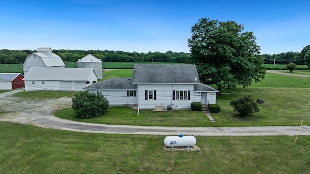 18521 Anderson Rd, Prophetstown, IL 61277 - view of front of home with driveway, a front lawn, and roof with shingles