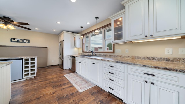 18521 Anderson Rd, Prophetstown, IL 61277 - kitchen featuring appliances with stainless steel finishes, glass insert cabinets, dark wood finished floors, hanging light fixtures, and recessed lighting
