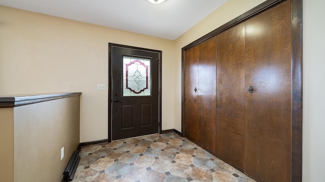 18521 Anderson Rd, Prophetstown, IL 61277 - foyer entrance featuring baseboards
