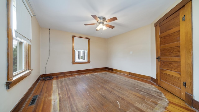 18521 Anderson Rd, Prophetstown, IL 61277 - spare room featuring healthy amount of natural light, ceiling fan, and light wood-type flooring