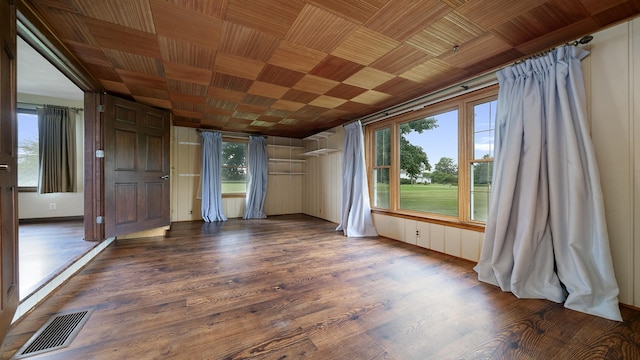 18521 Anderson Rd, Prophetstown, IL 61277 - spare room featuring wood finished floors and plenty of natural light