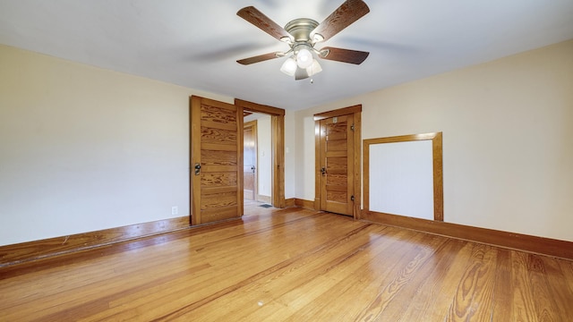18521 Anderson Rd, Prophetstown, IL 61277 - empty room with ceiling fan and wood finished floors