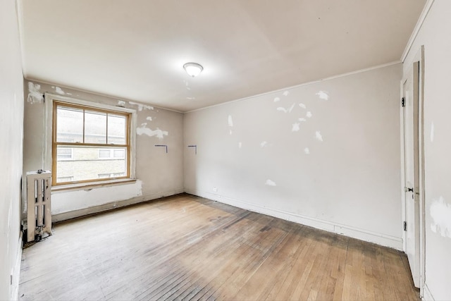 1532 E 59th St Unit J3, Chicago, IL 60637 - empty room featuring light wood-type flooring and ornamental molding