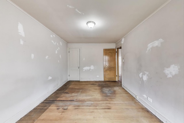 1532 E 59th St Unit J3, Chicago, IL 60637 - empty room with wood finished floors and ornamental molding